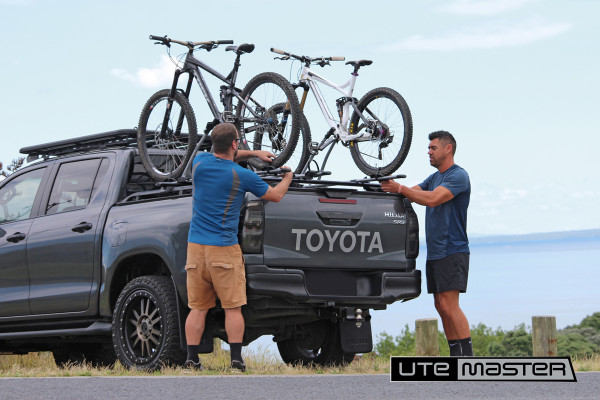 Toyota Hilux Grey Utemaster Load Lid with Roof Racks and Bike Carriers