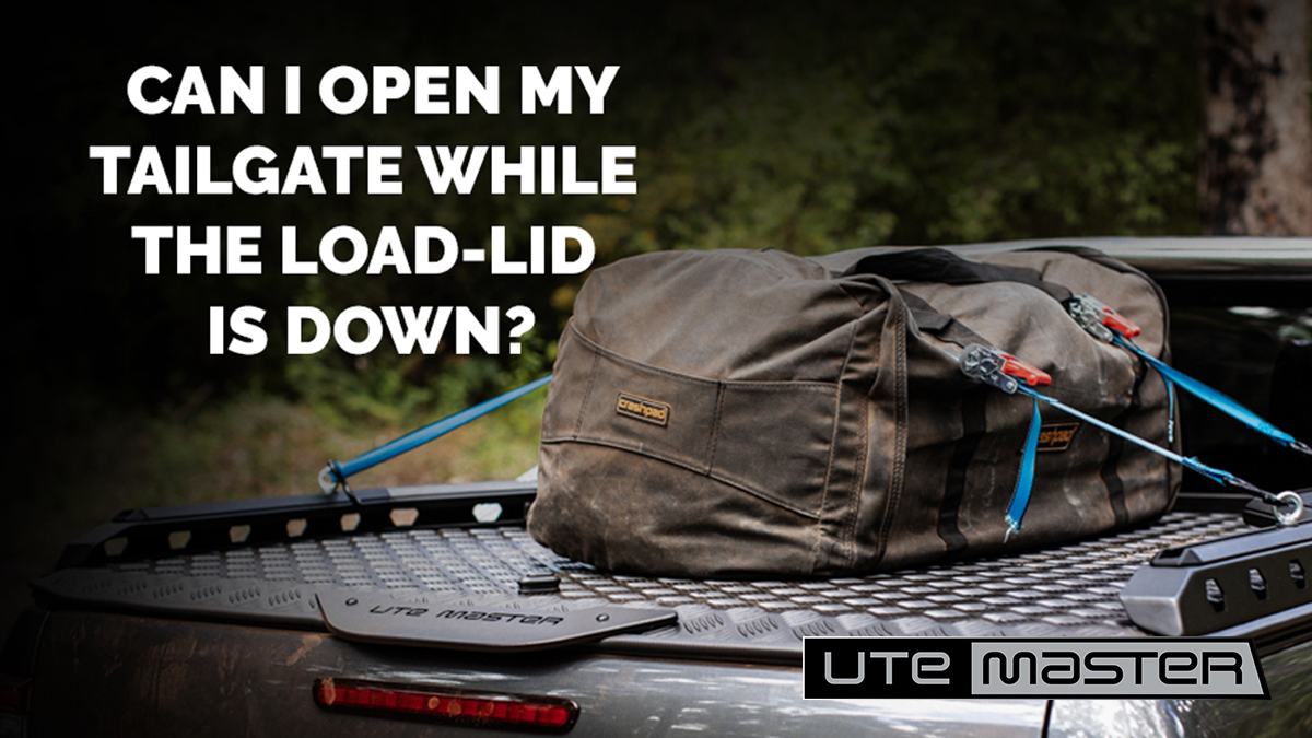 Can I open my tailgate while the Load-Lid is down?