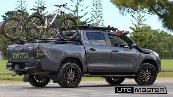 Toyota Hilux Grey Load Lid Black Biking Bike Carriers Hard Lid Cross Bars